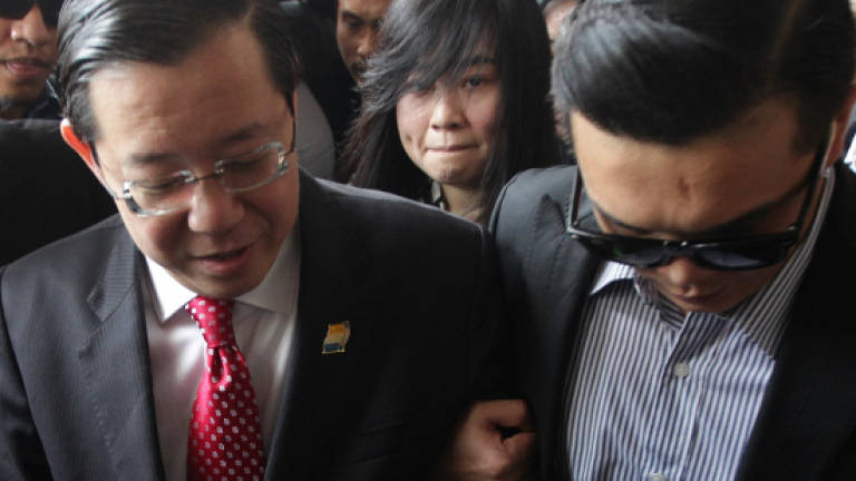 Guan Eng claims trial to charges of power abuse, graft (Updated) Guan Eng claims trial to charges of power abuse, graft (Updated)