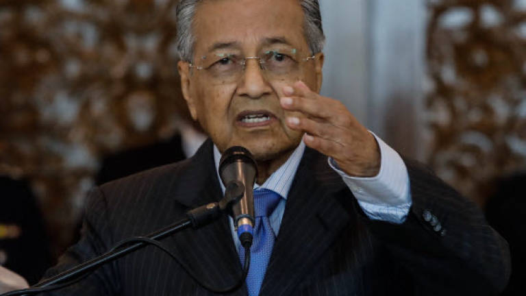 Tun M questions loyalty of govt officers who campaigned for BN in GE14 (Updated)