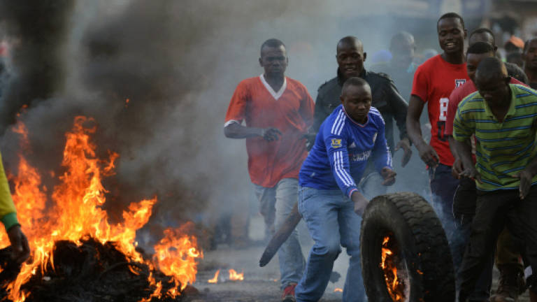 Four dead in Kenya as tensions soar over disputed poll