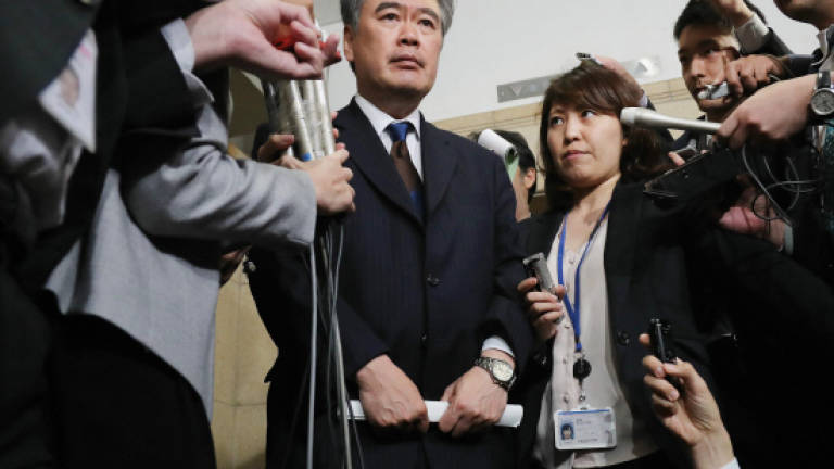 Top Japan official quits