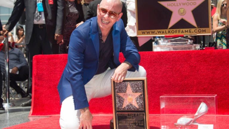 Rapper Pitbull gets star on Hollywood Walk of Fame