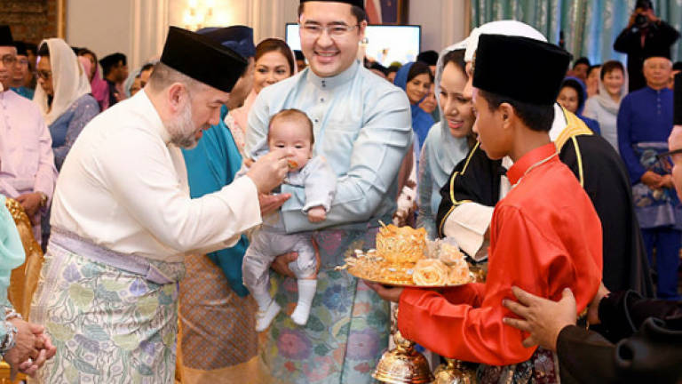 Agong attends 'cukur jambul' ceremony of PM's grandson