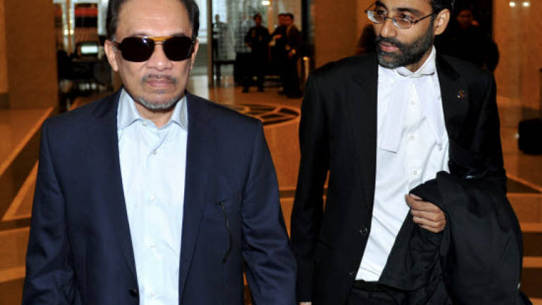 Anwar's appeal enters third day, defence continues with submission