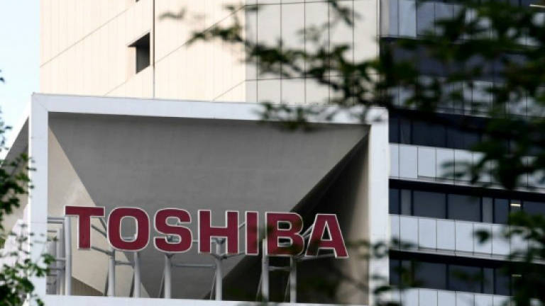 Deal sidelines bid to block sale of Toshiba chip unit