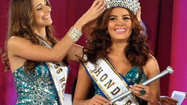 Honduras beauty queen, sister found dead