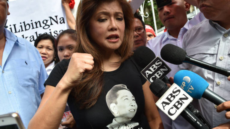 Daughter of former Philippine dictator urges forgiveness