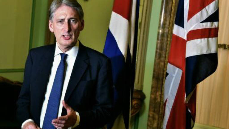 Britain's Hammond, Cuba's Castro agree on debt restructuring