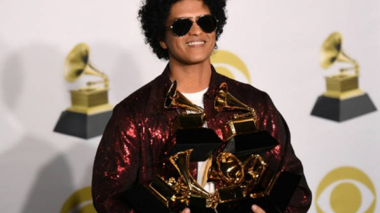 Fun-loving Bruno Mars divisive in his Grammy glory