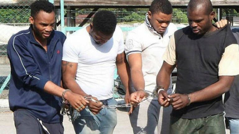 Two Nigerians charged with cheating woman, illegal entry