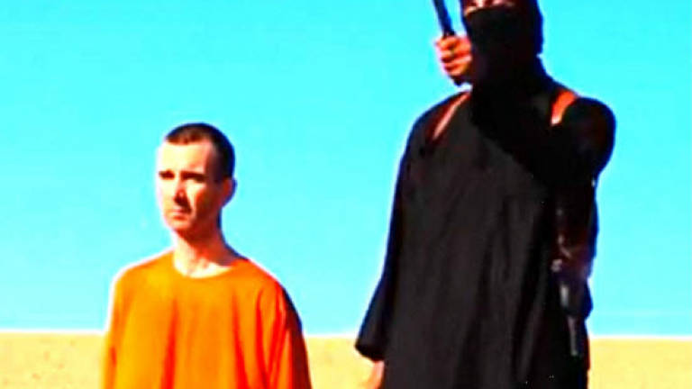 Cameron: Murder of British hostage an 'act of pure evil'