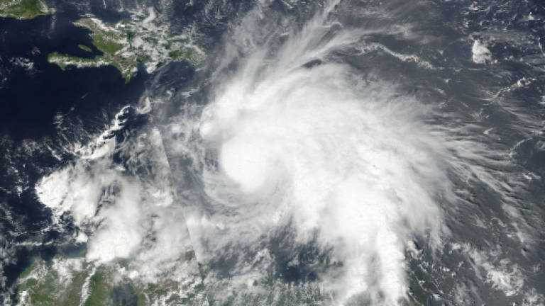 Powerful Hurricane Matthew churns towards Jamaica, Haiti