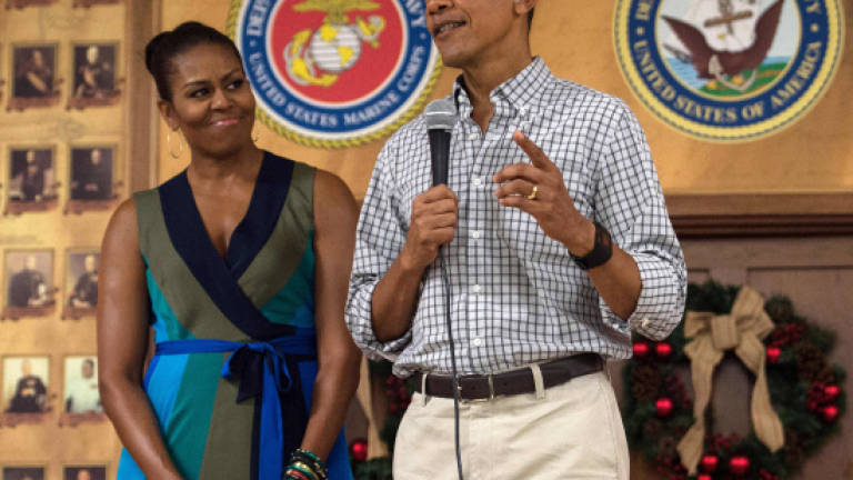 Obama pays last presidential holiday visit to Hawaii marine base