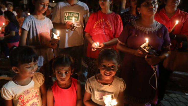 Candlelight vigil, prayers for assault victim