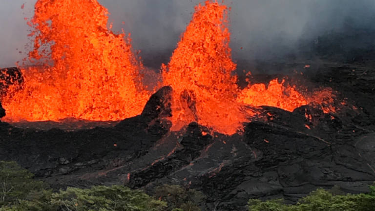 Lava flow closes in on Hawaii power plant