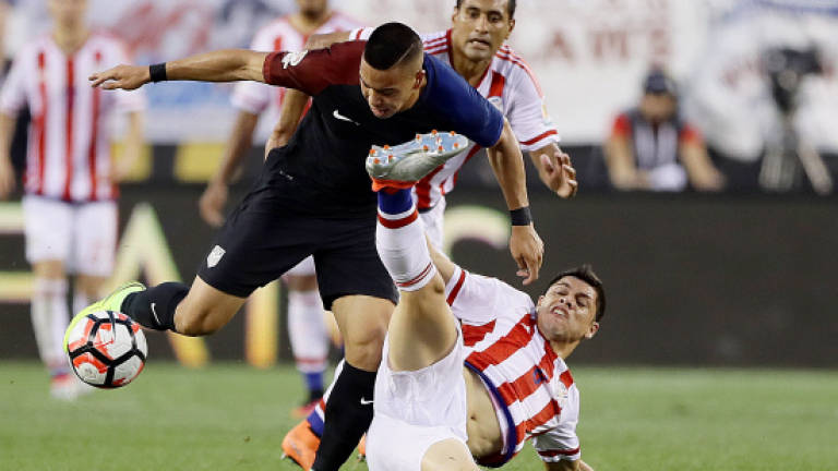 US into Copa quarters as Paraguay downed