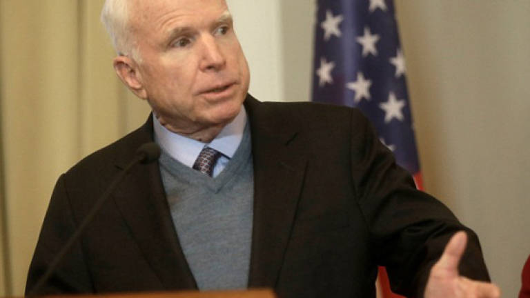 McCain: Russia cyber-attacks on US an 'act of war'