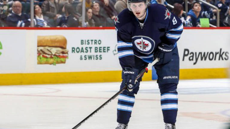 Jets defenseman Trouba banned two games for head blow