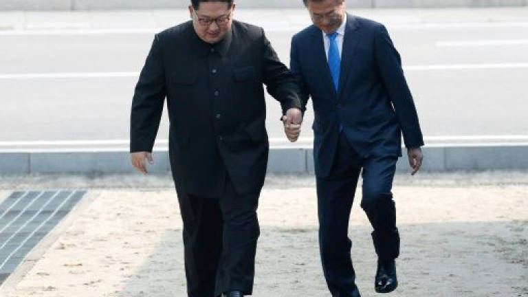 Frontier foxtrot: Moon and Kim's unprompted DMZ dance