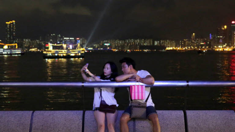 For dating apps in Asia, love by numbers or chaperone