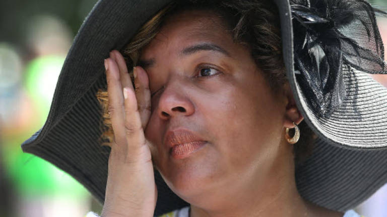 New Orleans mourns dead, celebrates life on Katrina anniversary