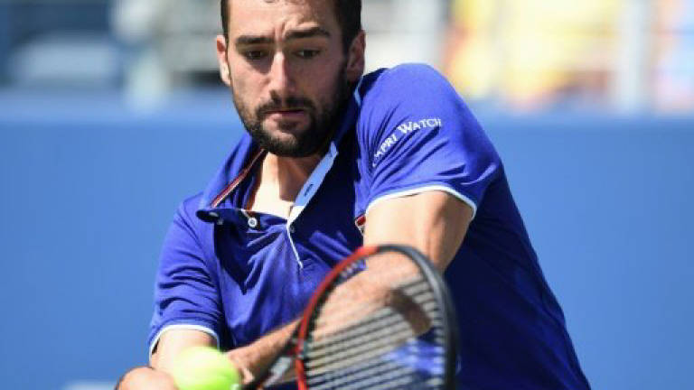 Past champ Cilic ousted as Sharapova seeks US Open last 16