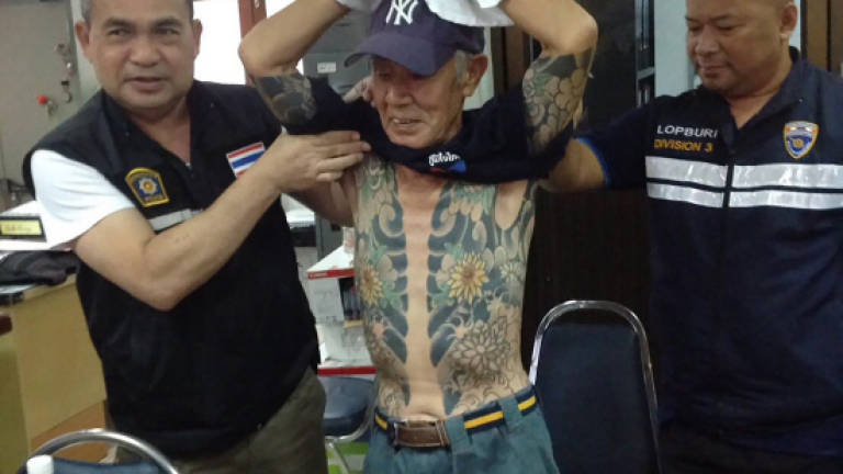 Japanese crime boss held in Thailand after 'yakuza' tatts go viral