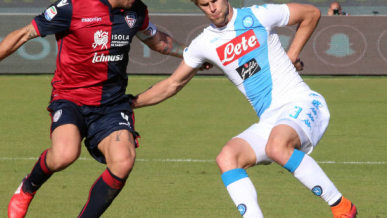 Mertens hat-trick as five-star Napoli rout Cagliari