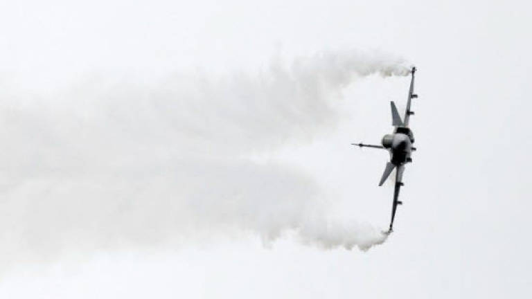 Thai pilot killed when jet crashes during air show for kids