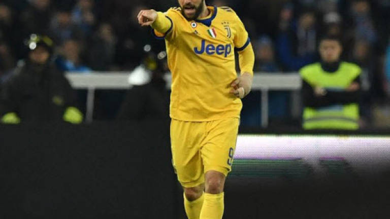 Juventus' injury-stricken Higuain ends Napoli run
