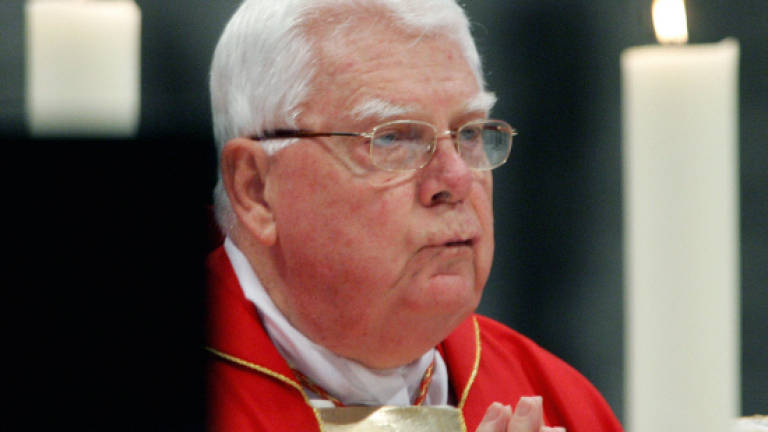 US Cardinal Law, forced to quit over sex abuse scandal, dies aged 86