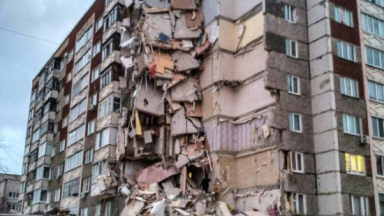 Toll hits 6 after collapse of Russian highrise