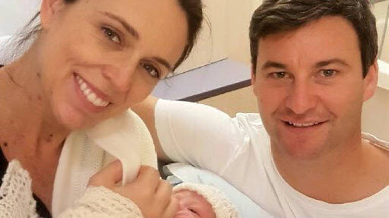 New Zealand PM stays in hospital with 'hungry' baby