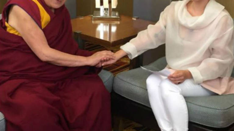 Chinese Internet on edge of outrage after Lady Gaga meets Dalai Lama