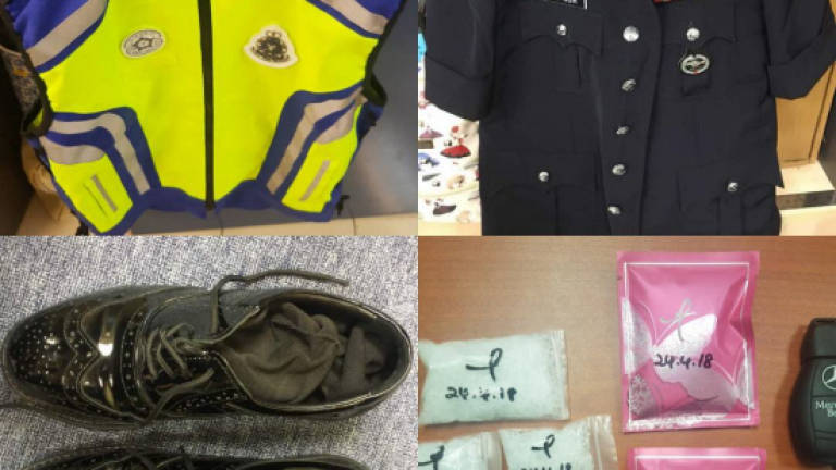 Cops nab drug pushers in possession of a police uniform