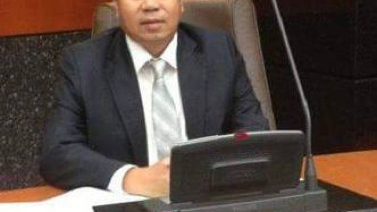 Selangor BN assemblyman wants to stop foreign workers from taking free bus rides
