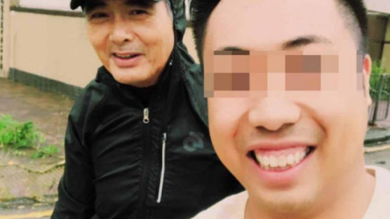 Chow Yun-fat helps to clean up HK streets after Typhoon Hato