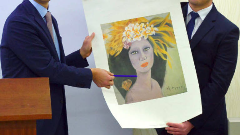 Prosecutors say artist’s ‘fake’ work is genuine