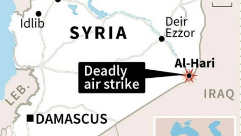 Dozens of pro-regime fighters killed in east Syria strike