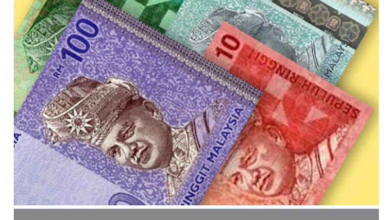 Ringgit ends almost flat against US dollar