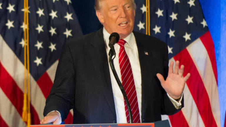 Trump vows 'Cold War' terror fight, immigrant controls