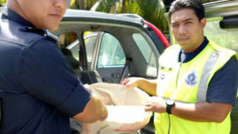 Durian thief escapes, then gets caught after accidental burp
