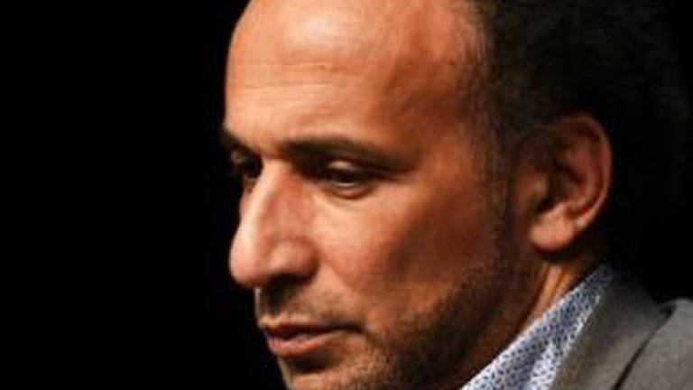 Rape-accused Islam scholar Tariq Ramadan held in Paris