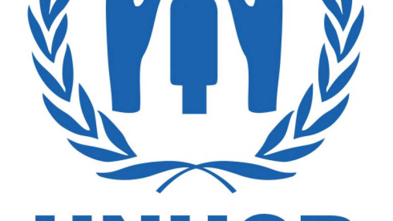UNHCR banned from issuing refugee cards
