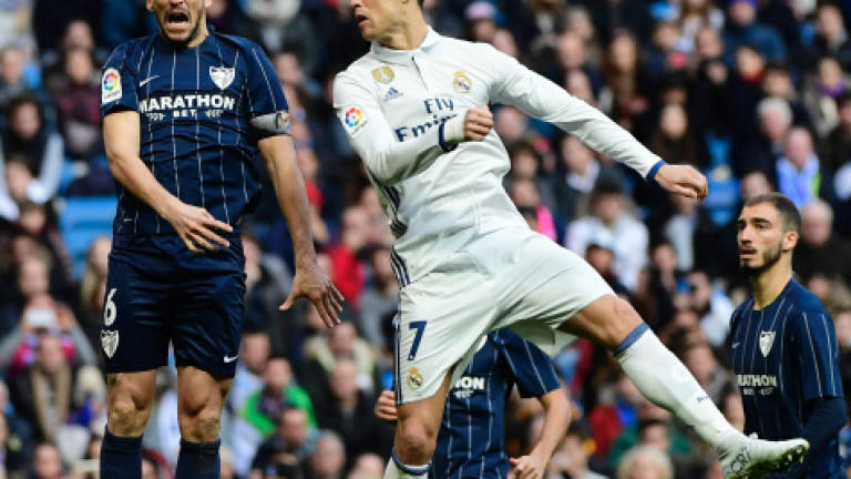 Ramos saves Madrid as fans target Ronaldo