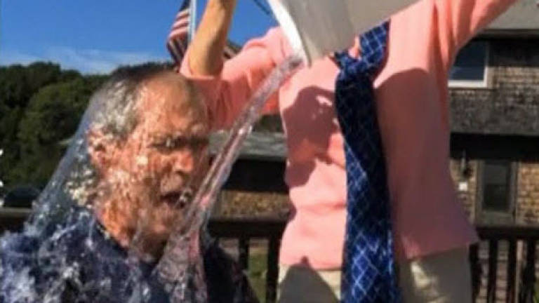 Bush takes ice bucket challenge