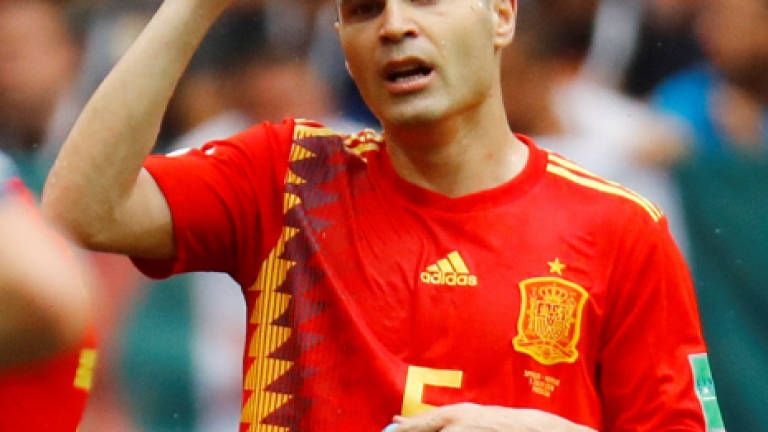 World Cup winner Iniesta ends Spain career after Russia defeat