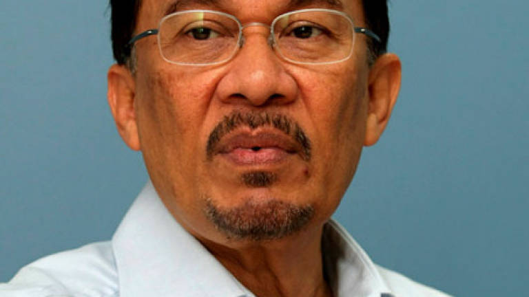 Anwar undergoing intensive physiotherapy at Cheras Rehabilitation Centre