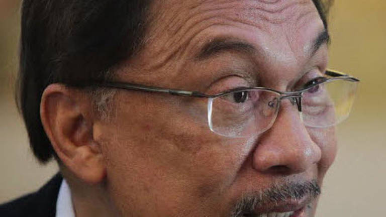 High Court judge recused from hearing Anwar's judicial review application