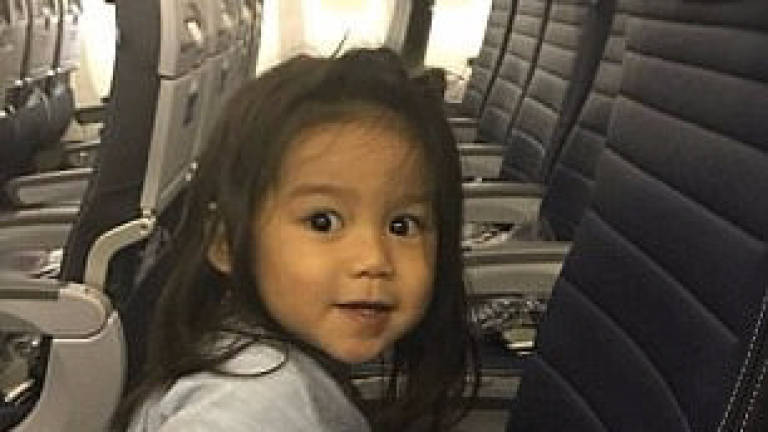 United Airlines sued by mother who forced to hold child on lap for 3-hour flight