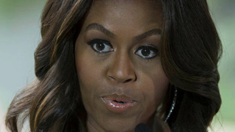 Michelle Obama accidentally tweets phone number of ex-staffer